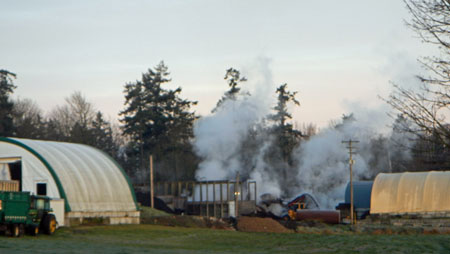Wood grinding business on farm land